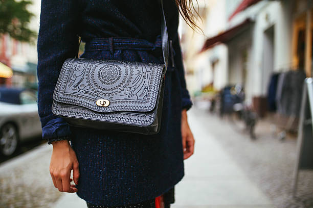 Exploring the Choice: New vs. Pre-Owned Designer Handbags
