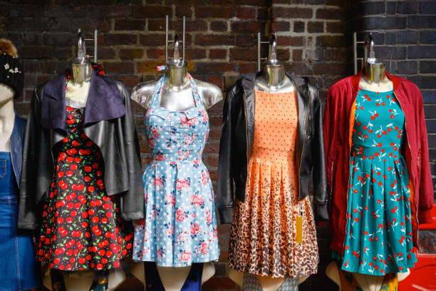 Elegant designer garments on display in a renowned London charity shop